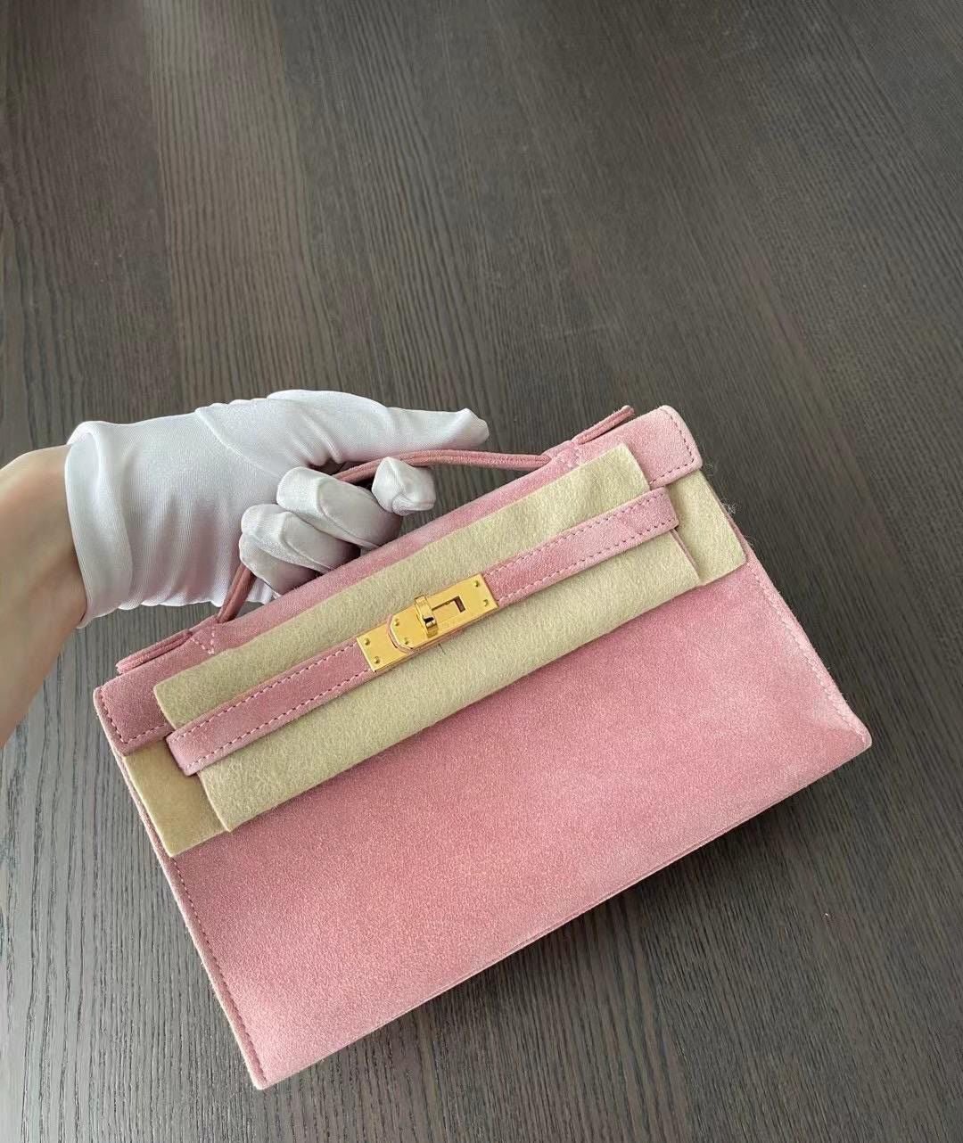 Hermès Kelly Pochette Pink Veau Doblis Suede with Gold Hardware