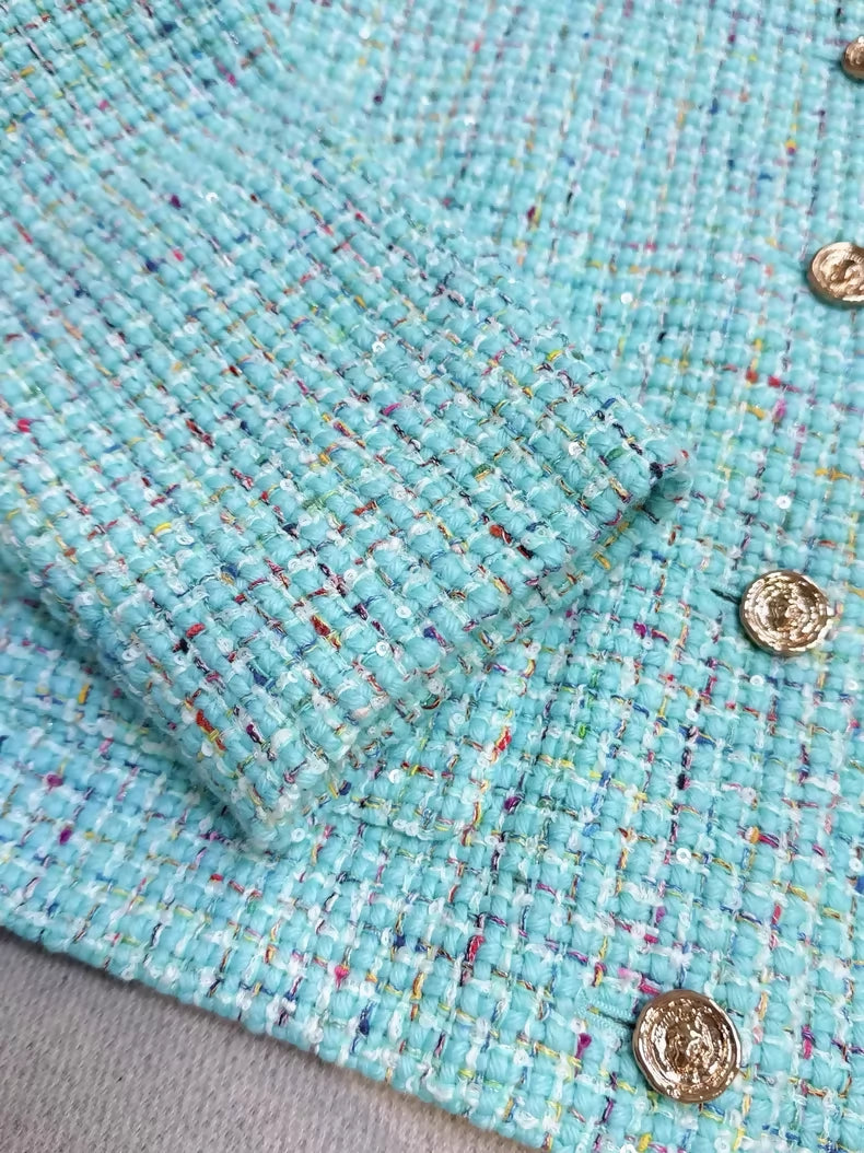 Chanel 25A light blue tweed jacket with gold lion buttons
