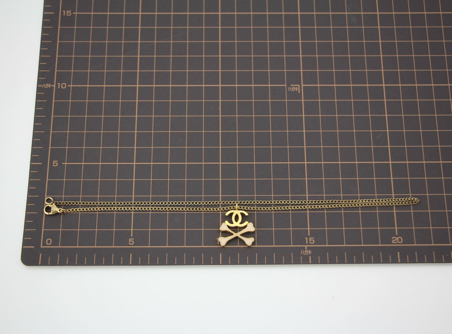 Chanel Vintage 03P Gold-plated CC Enamel White Skull Necklace
