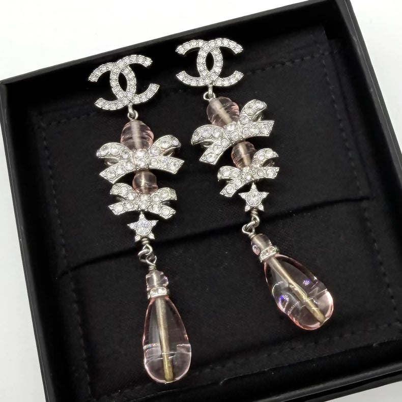 Chanel pink crystal diamond bow earrings