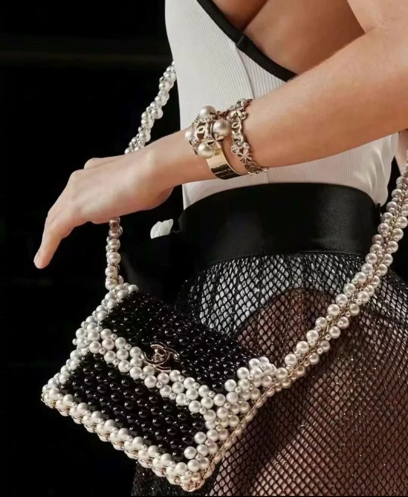 Rare CHANEL 2022 SS BLACK
WHITE FAUX PEARLS LARGE FLAP EVENING BAG WITH GOLD HARDWARE