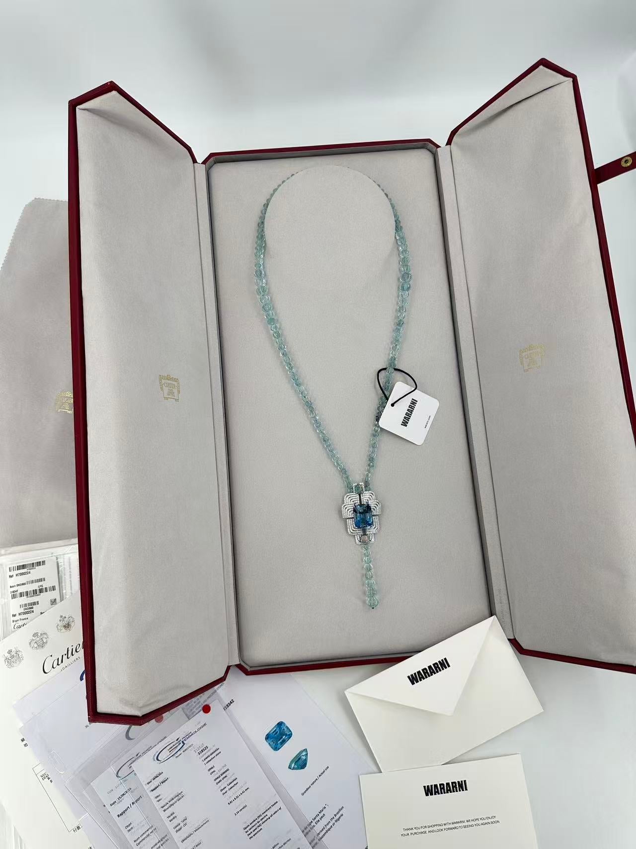 Cartier High Jewelry Necklace - Main stone: 37-carat aquamarine; two opals; chain beads: topaz.