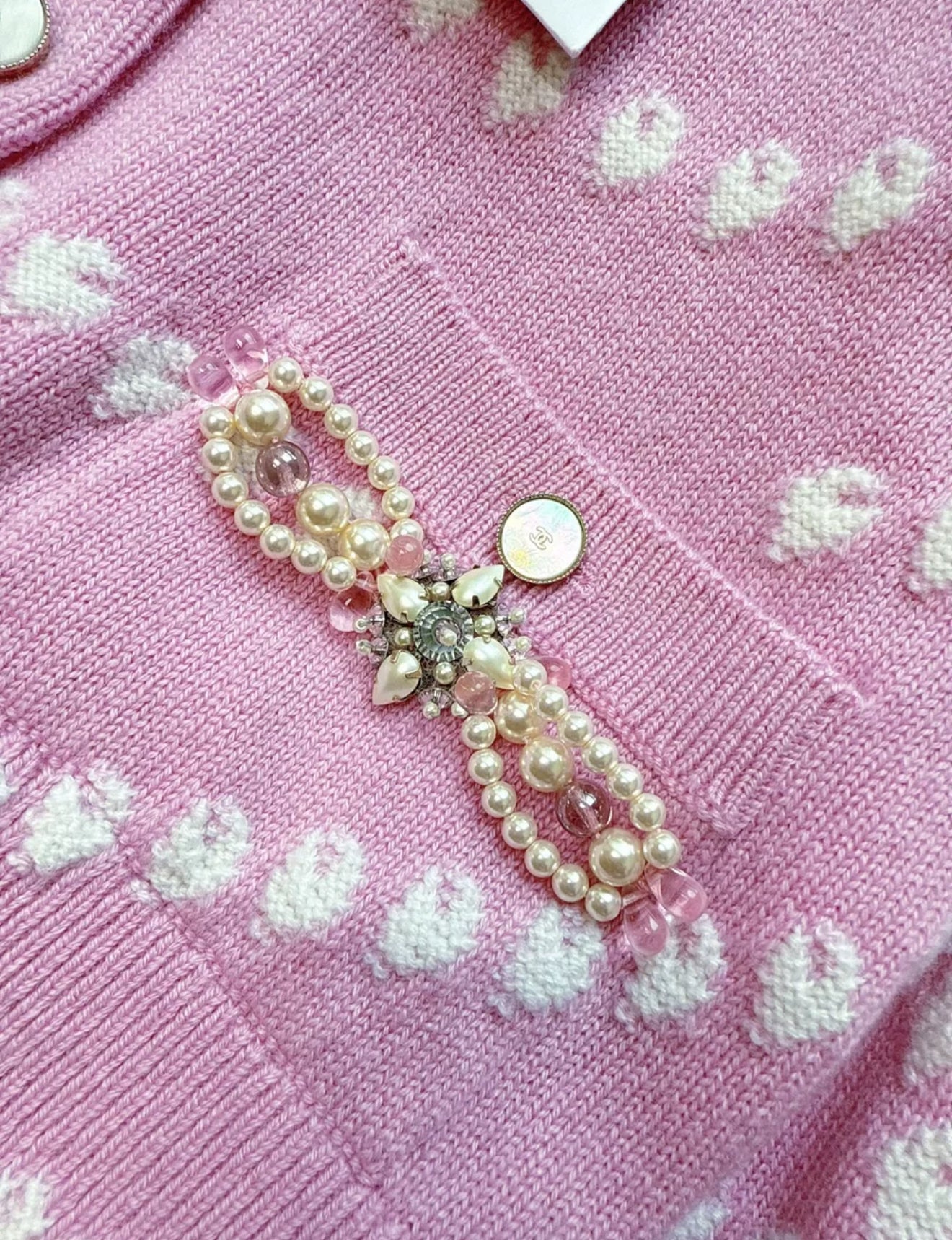 Chanel 25P pink pearl knitted cardigan