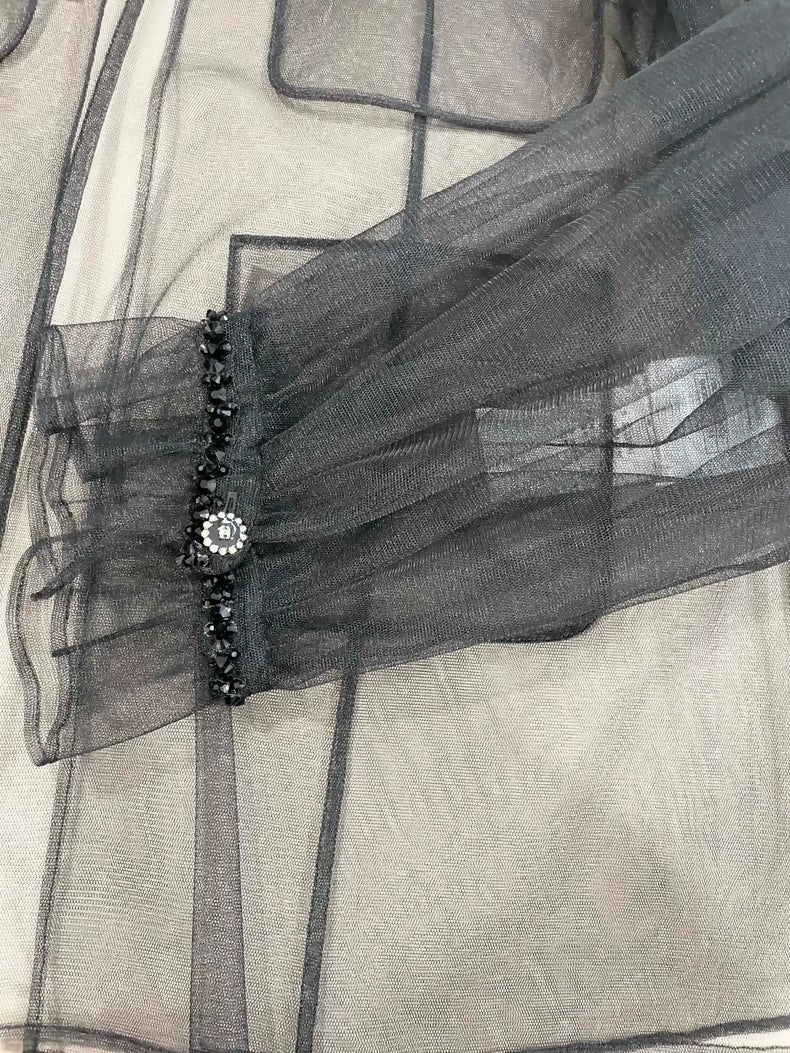 Chanel 25K black tulle blouse with bow