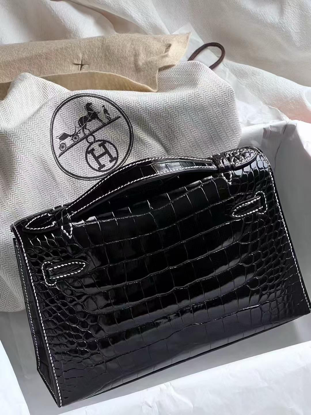 Hermès Kelly Pochette Black Shiny Porosus Crocodile Palladium Hardware