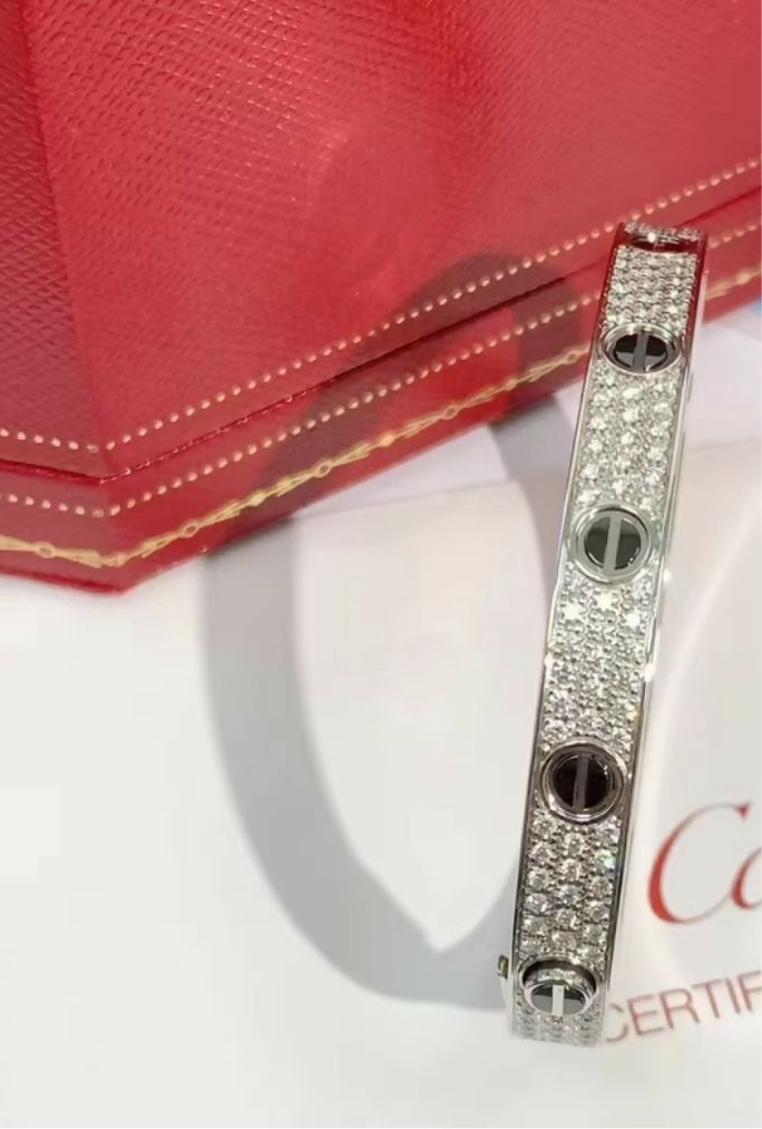 Cartier Love Wide Bracelet – Black Ceramic
White Gold with Diamonds (Size 17)