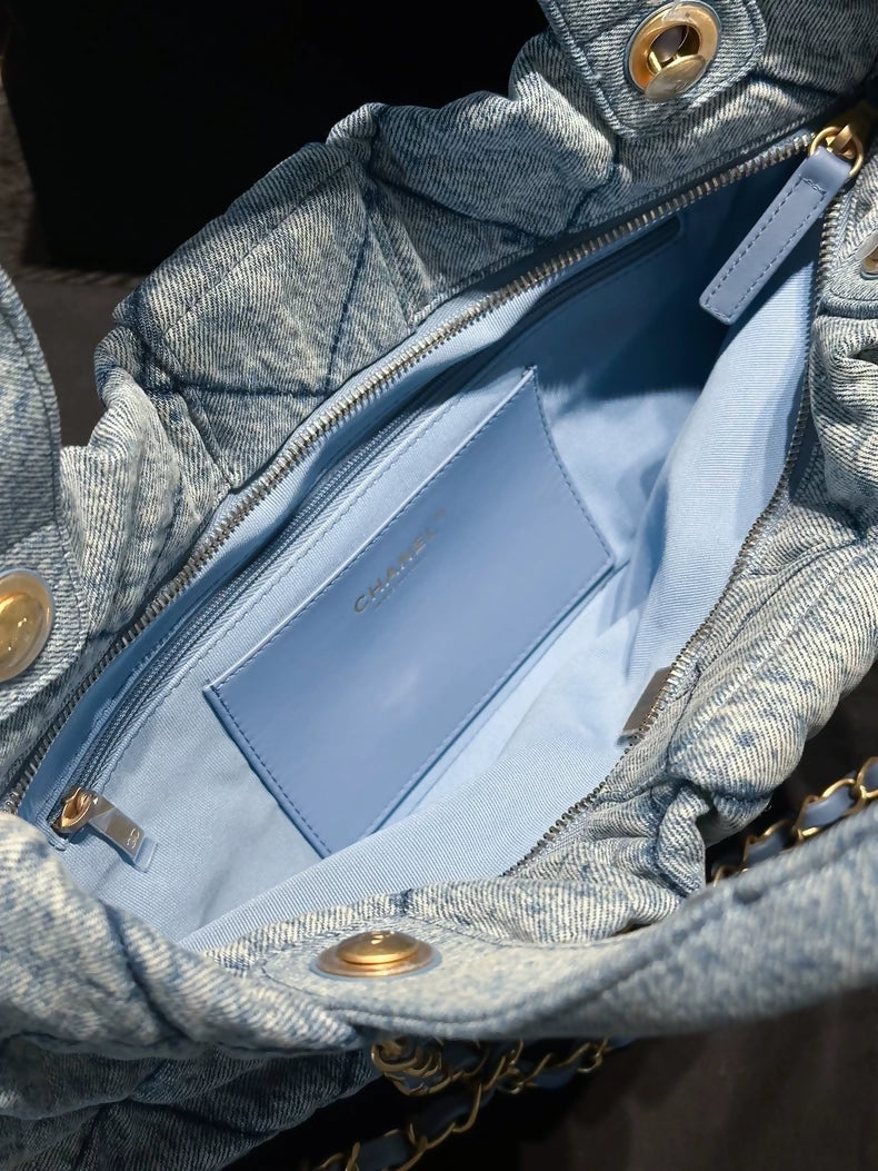 Chanel 25 light blue denim bow bag with gold hardware chain