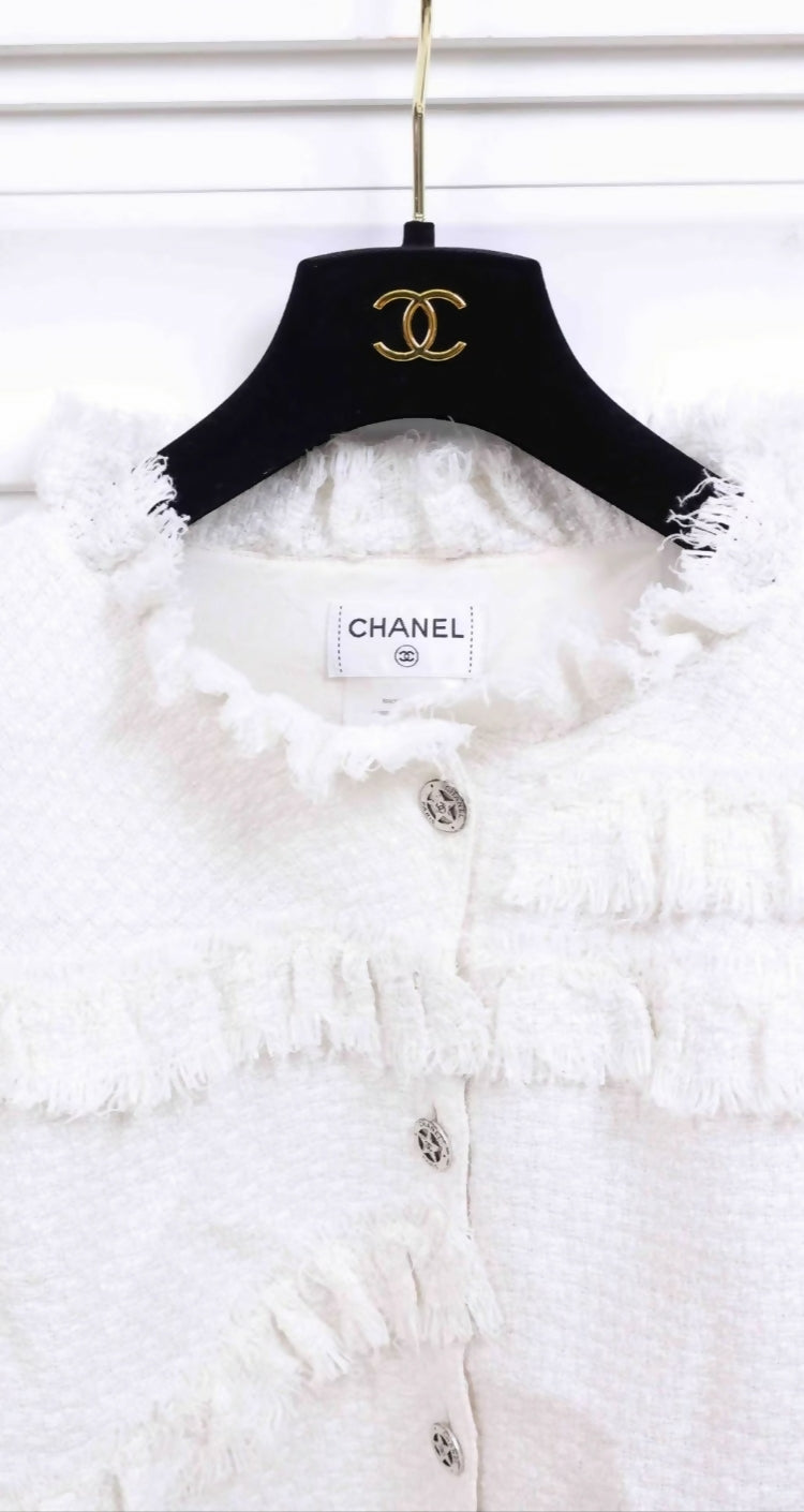 Chanel 2014 off white tweed jacket.