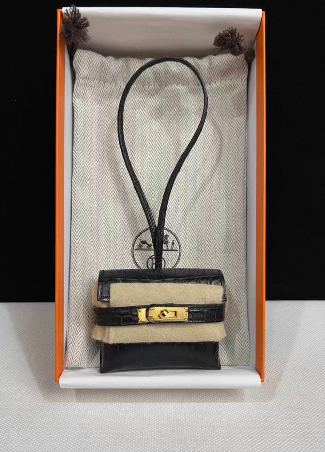 Hermès Kelly festival charm in matte crocodile leather gold hardware