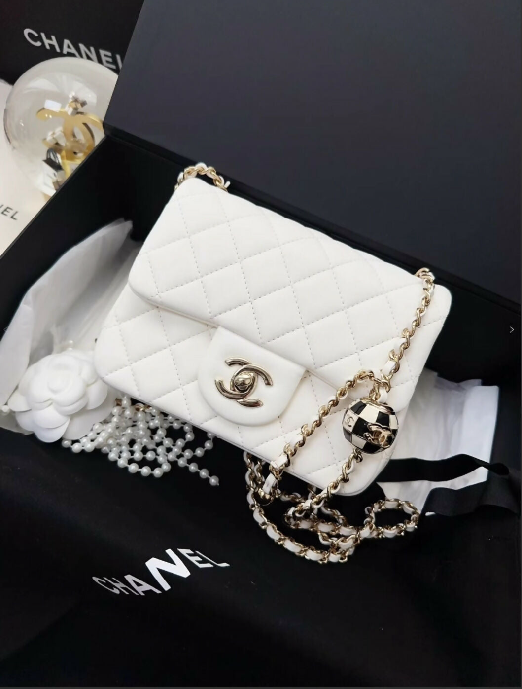 Chanel 23c white leather with gold Chain ball Bag – Wararni.com Chanel 23c white leather with gold Chain ball Bag – Wararni.com