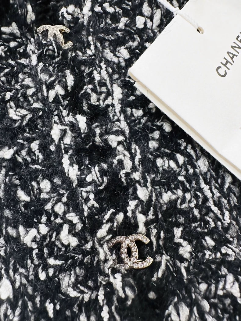 Chanel 25B black and white lace-trimmed cardigan and skirt set