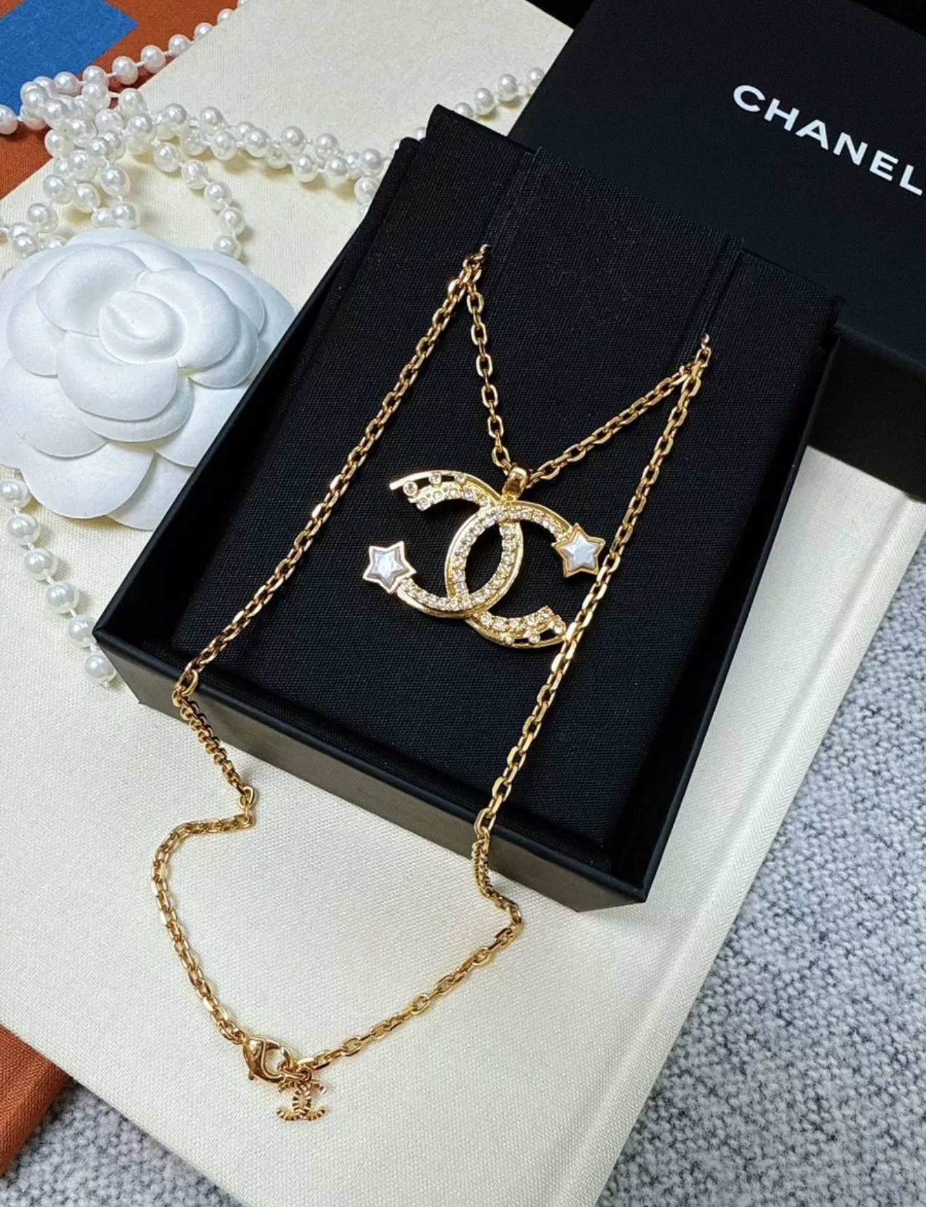 Chanel 24C gold shooting star double C necklace – Wararni.com