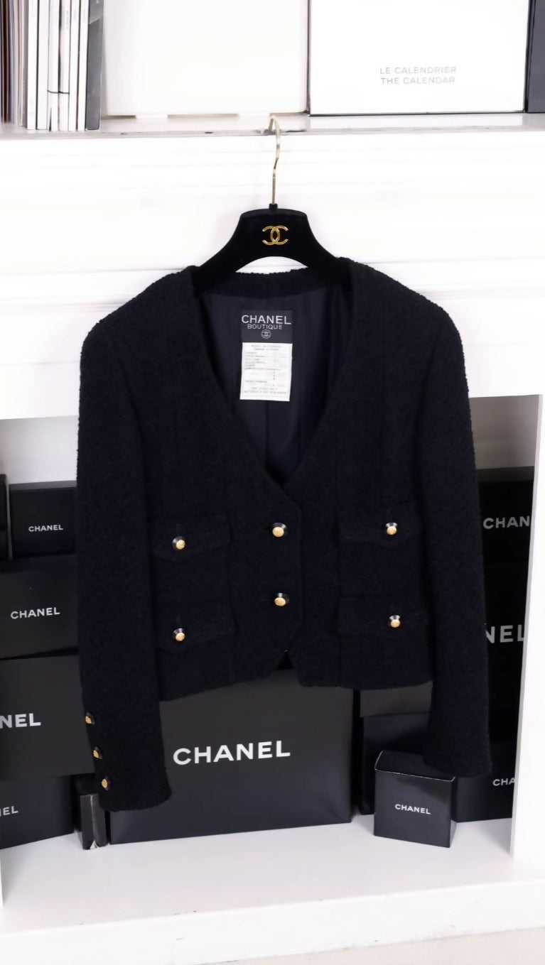 Chanel 1993 Black Wool Four-Pocket Cropped Jacket with Black and Gold Buttons.