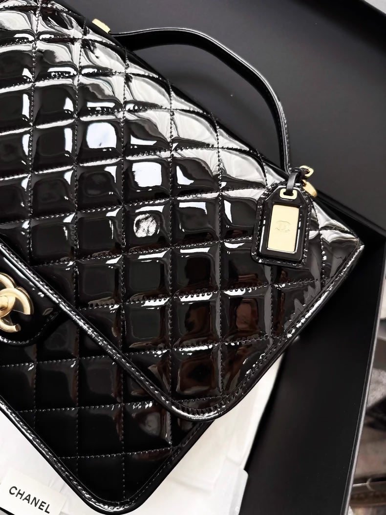 Chanel 22k black patent leather backpack