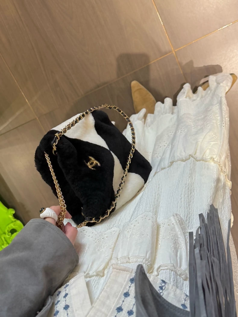 Chanel 21A black and white shearling bag