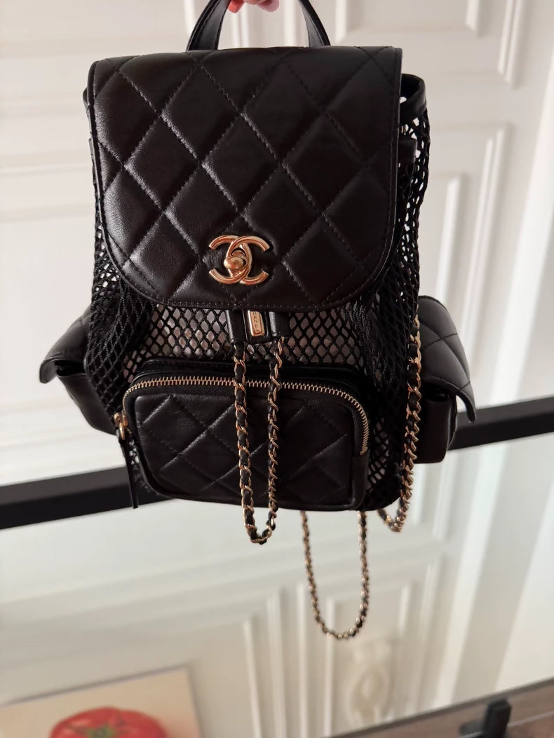 Chanel 25S black mesh backpack in gold hardware