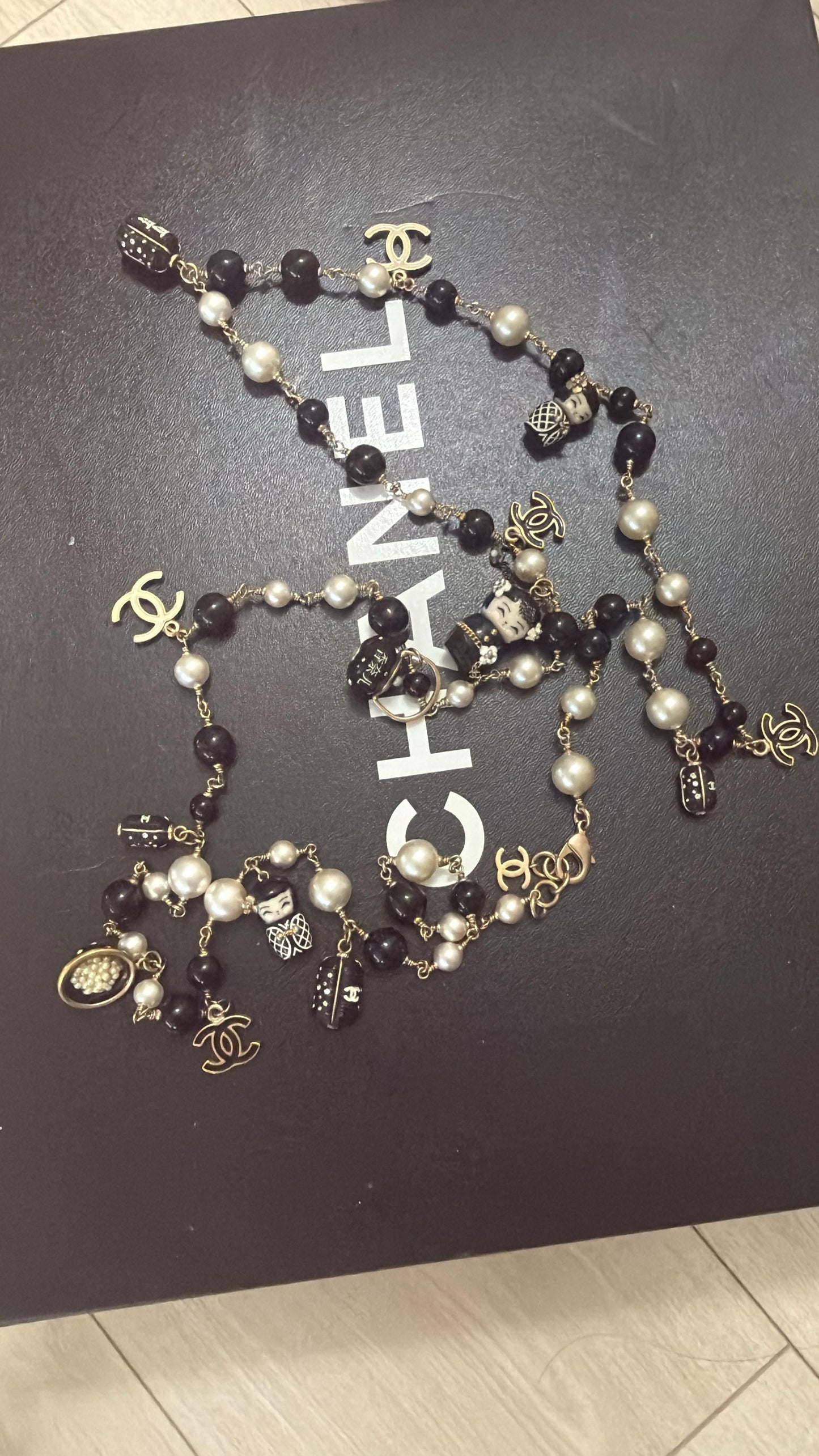 Chanel 10A Paris Shanghai Matryoshka Doll Pearl Charm Necklace/Belt — Ultra-Rare Collector Piece
