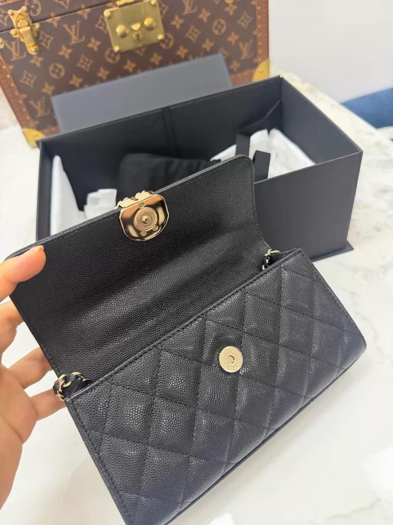 Chanel 25S black leather top handle bag gold hardware