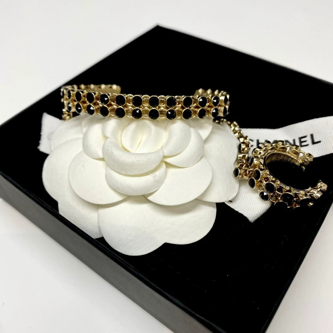 CHANEL 21k limited edition black & gold ring and bracelet