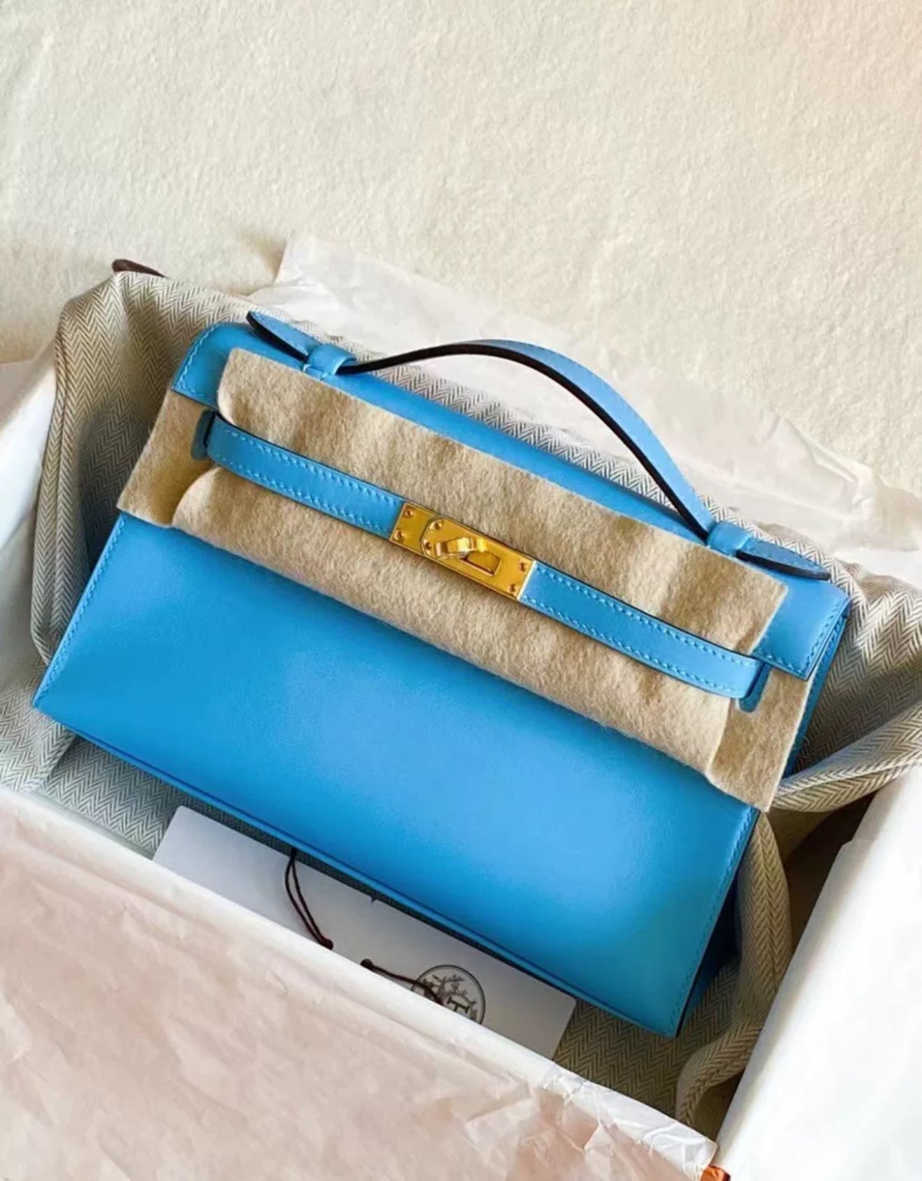 HERMÈS KELLY POCHETTE BLEU CELESTE SWIFT LEATHER GOLD HARDWARE
