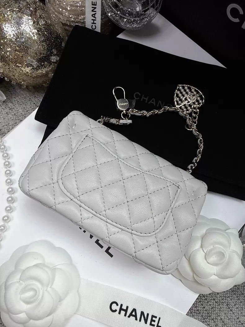 CHANEL 25A CF mini light grey quilted lambskin heart charm bag