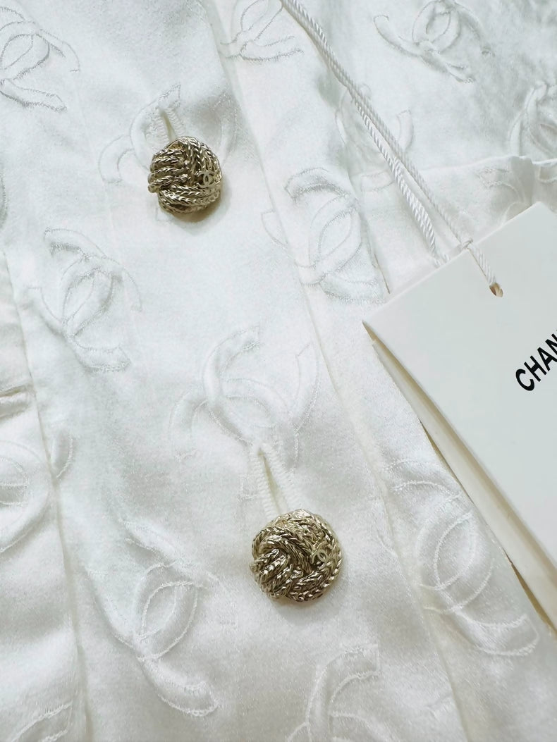 Chanel 25a ecru cardigan