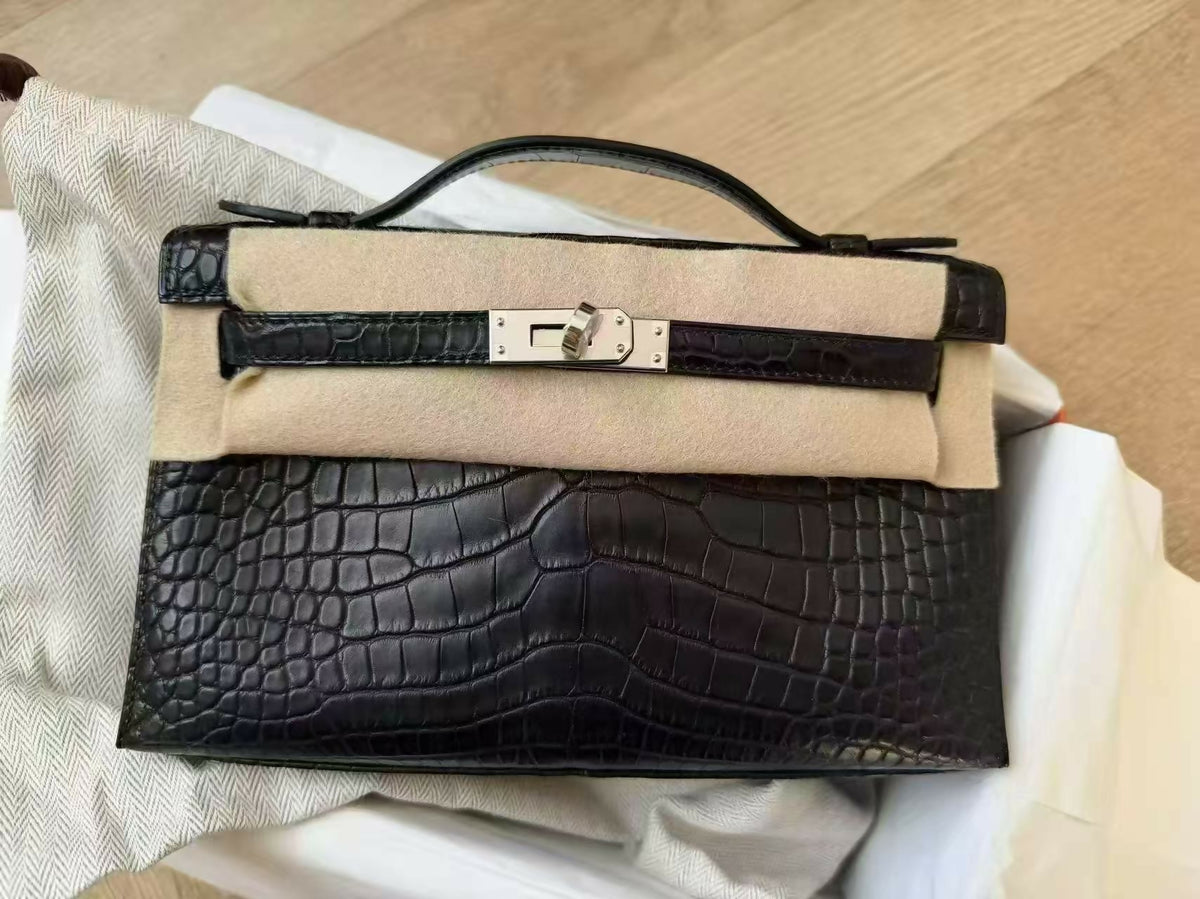 Hermès Kelly pochette Noir / Black Matte Crocodile with Palladium Hardware