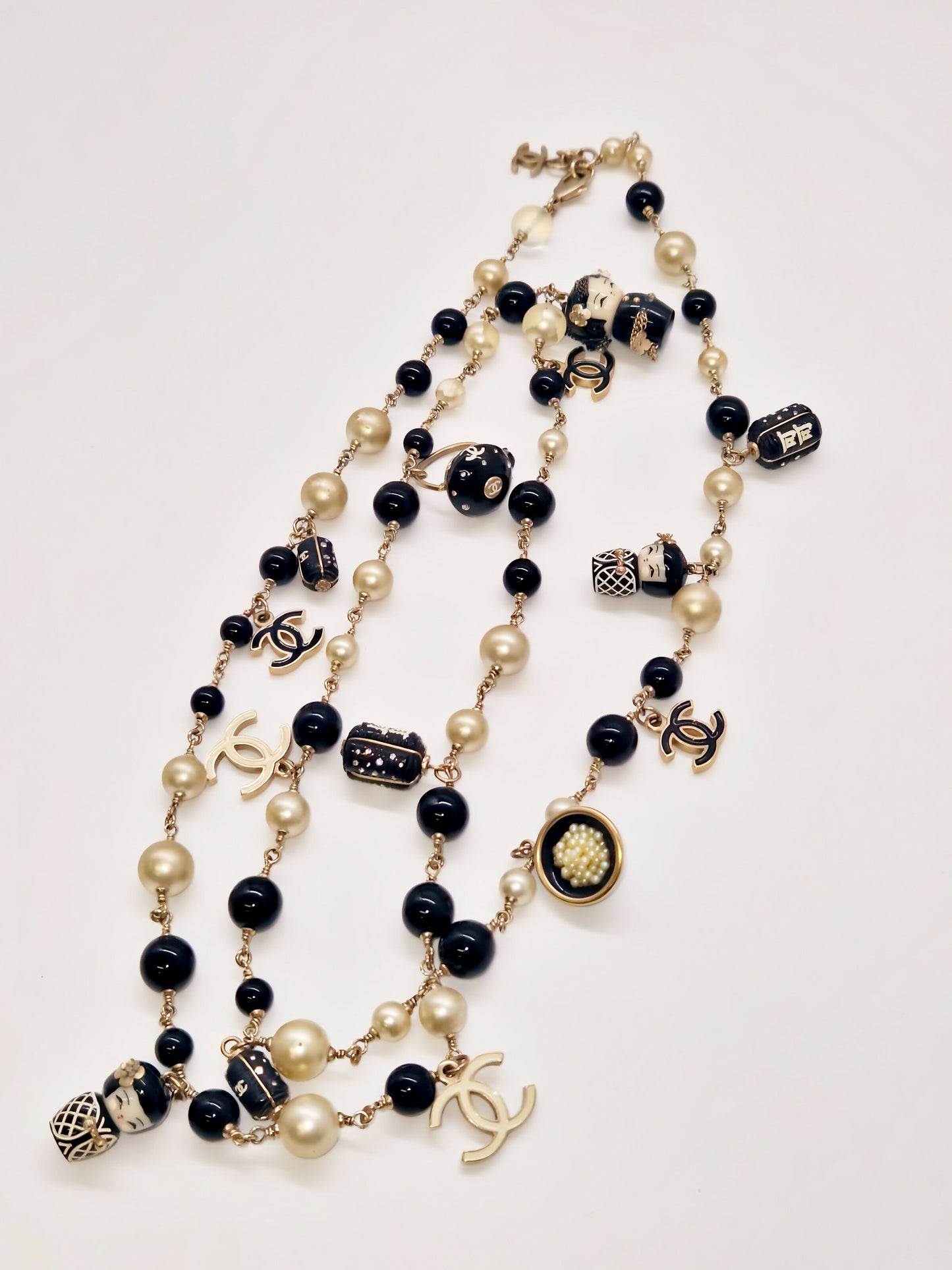 Chanel Vintage Shanghai Doll CC Necklace.