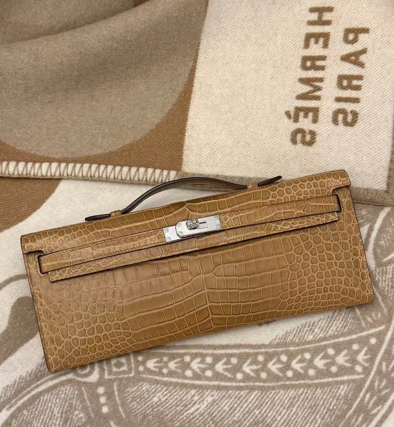 Hermès Kelly cut gold matte crocodile leather palladium hardware