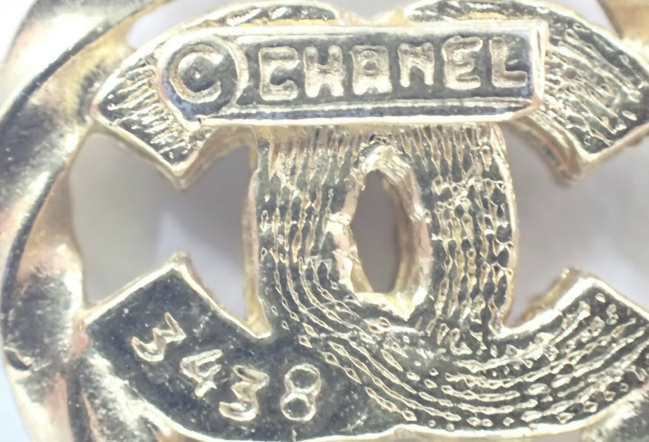 Chanel Vintage 1982 Rhinestone Gold Plated Braided Medallion Interlocking Coco Mark Necklace