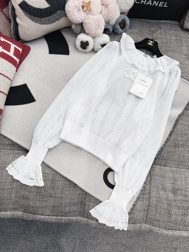 Chanel 25p white ruffle top