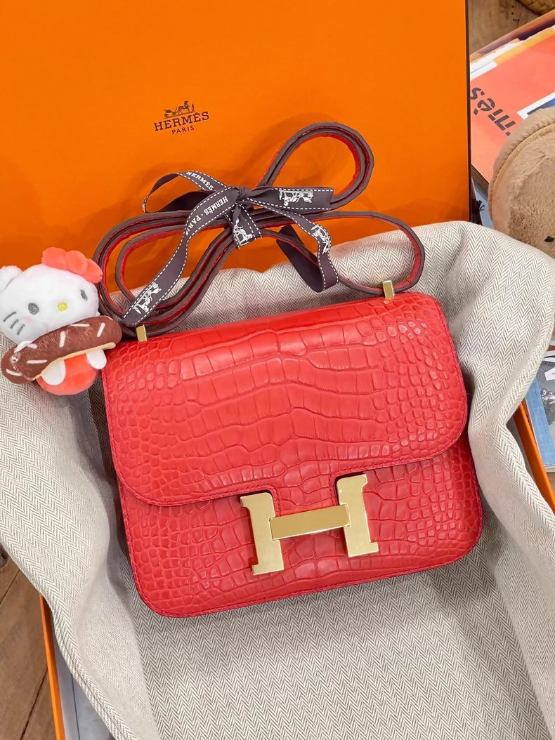 Hermès Constance Mini A5 azalea red, matte Alligator leather gold