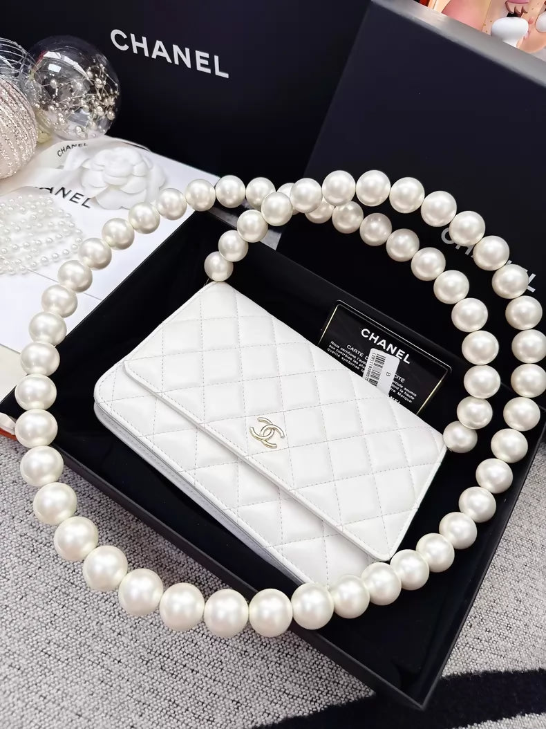 Chanel 20k ecru gold pearl chain WOC shoulder bag