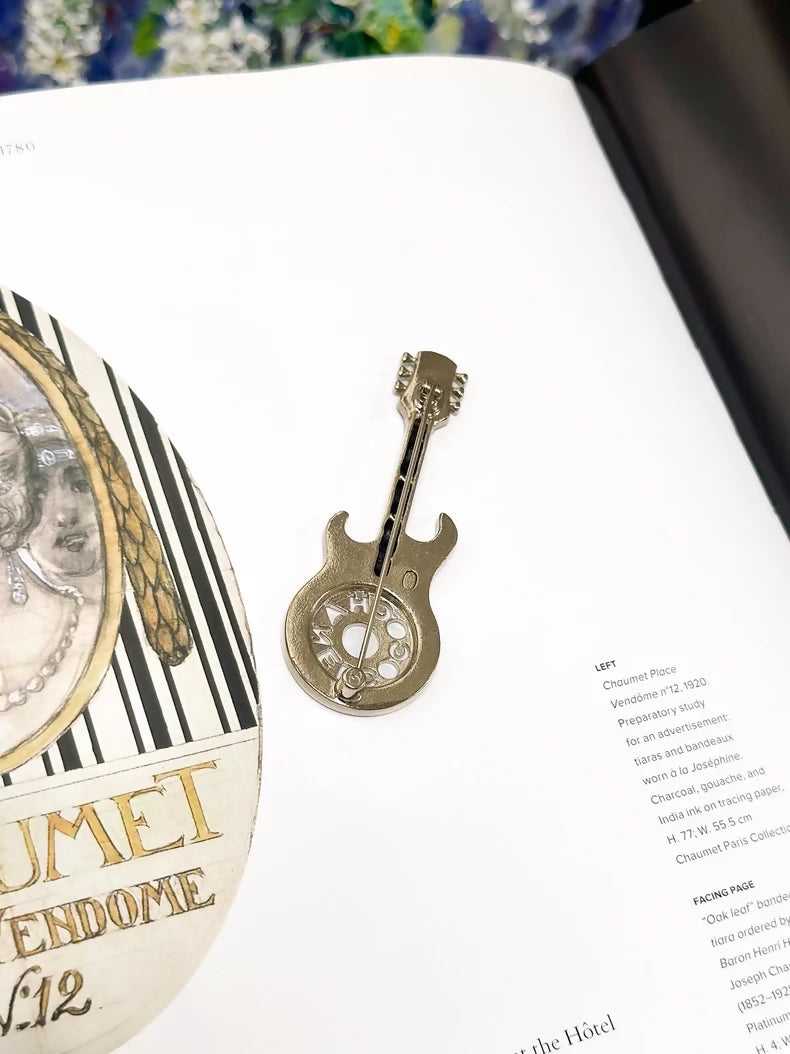 Chanel 24A enamel leather chain guitar-shaped brooch