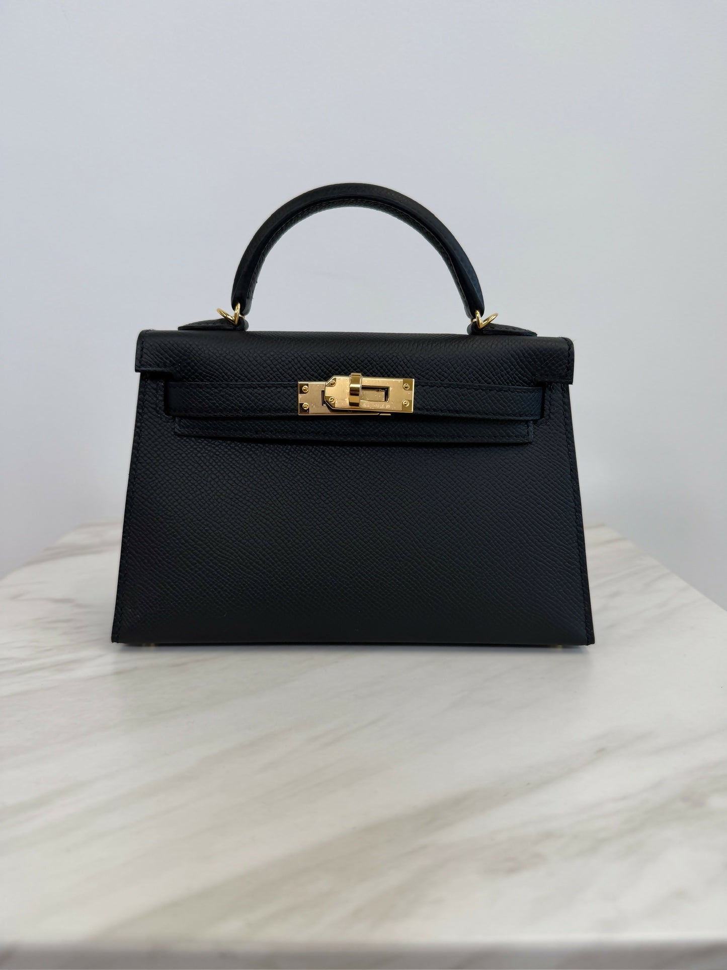 Hermès Kelly 20 Black Epsom GHW G 2026