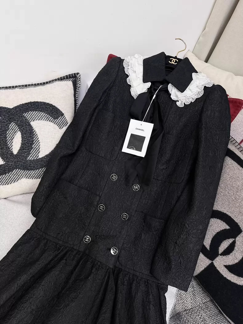 Chanel 21A Black Embossed Long Coat with Ruffled Collar