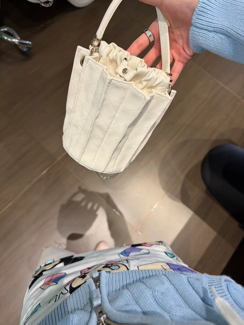 Chanel 25A mini pleated bucket bag