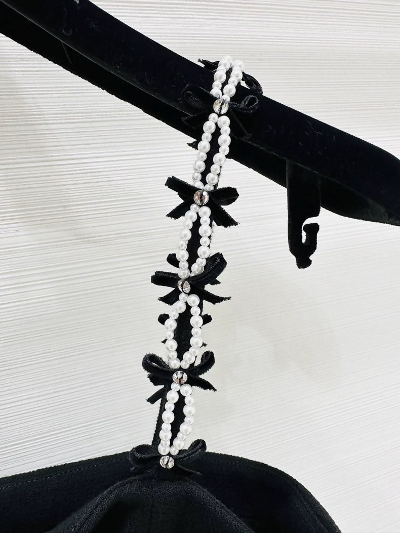 Chanel 25b black top with pearls bow