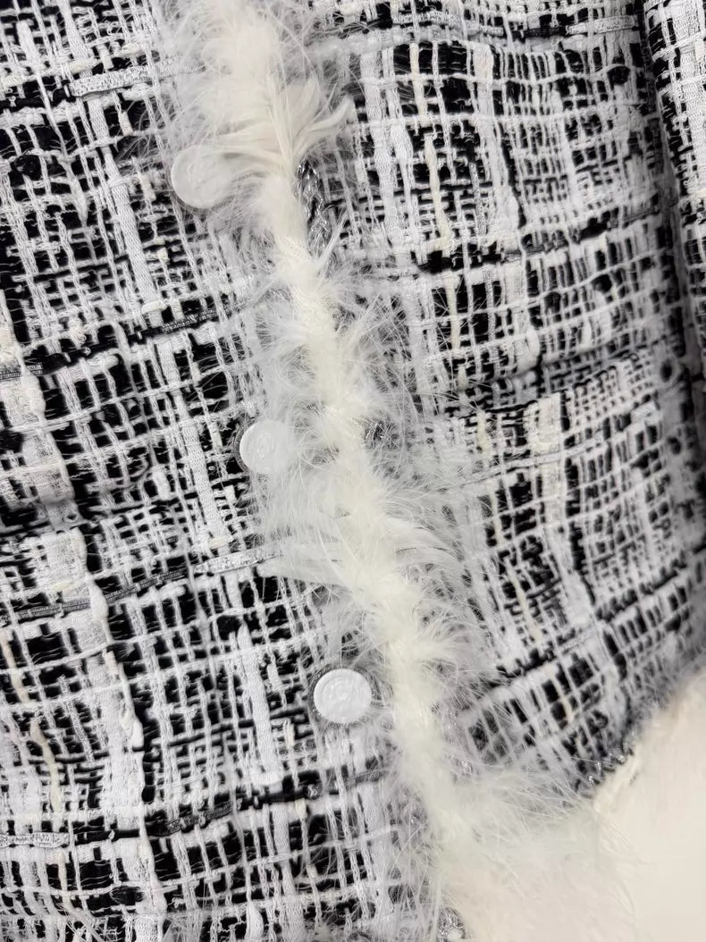 Chanel 25S black and white tweed jacket