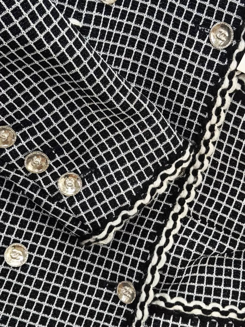 Chanel 25 black and white tweed jacket