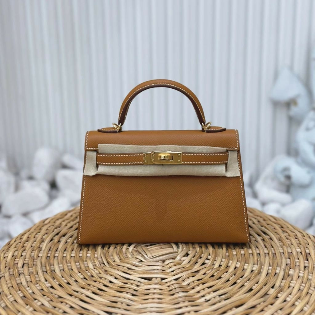 hermes backpack mini 2024 Kelly Jump Etoupe Swift with Palladium Hardware Crafted from top Hermes Small Bag Mini Herms