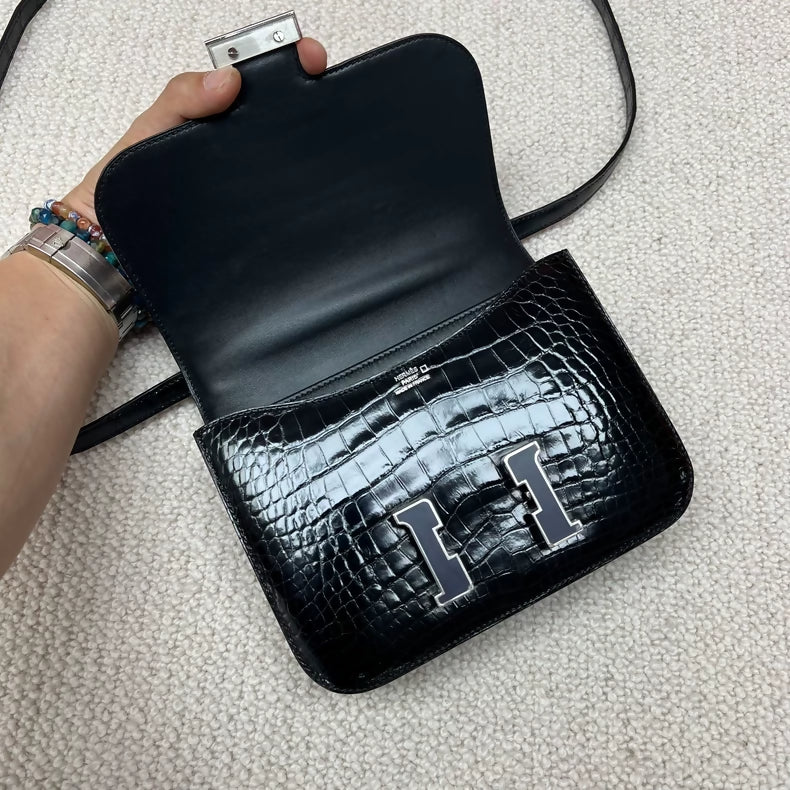 Hermès Constance 19 shiny crocodile leather black & palladium hardware