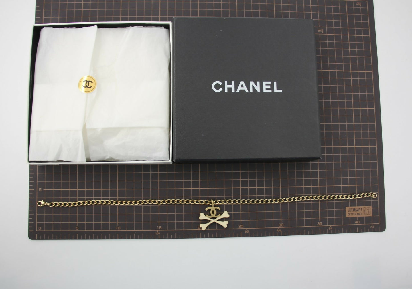 Chanel Vintage 03P Gold-plated CC Enamel White Skull Necklace