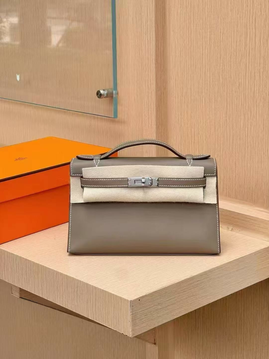 Hermès Kelly pochette Étoupe Swift Leather with Palladium Hardware