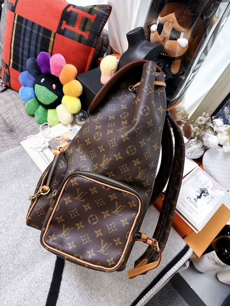 Louis Vuitton Trio monogram chain backpack