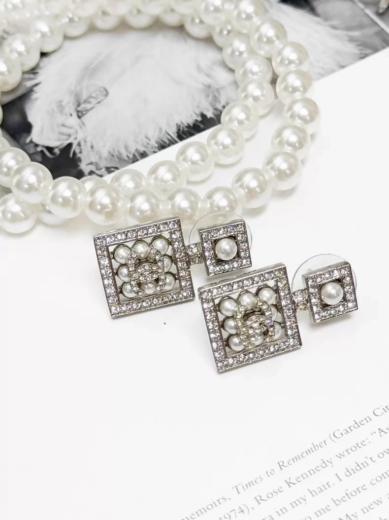 Chanel Spring/Summer 2024 silver double C pearl stud earrings