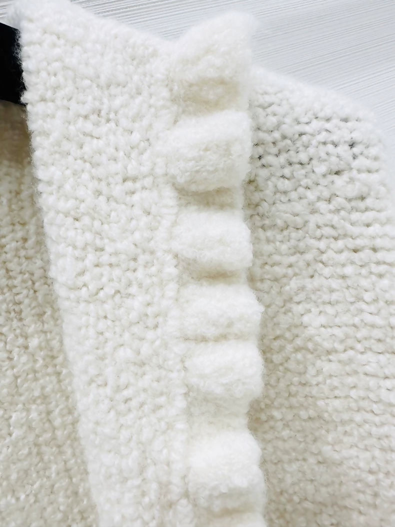 Chanel 24k off-white knit top with ruffled sleeves and a V-neck