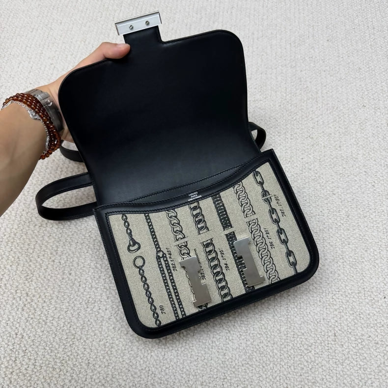 Hermès Constance 24 black leather & grey canvas palladium hardware