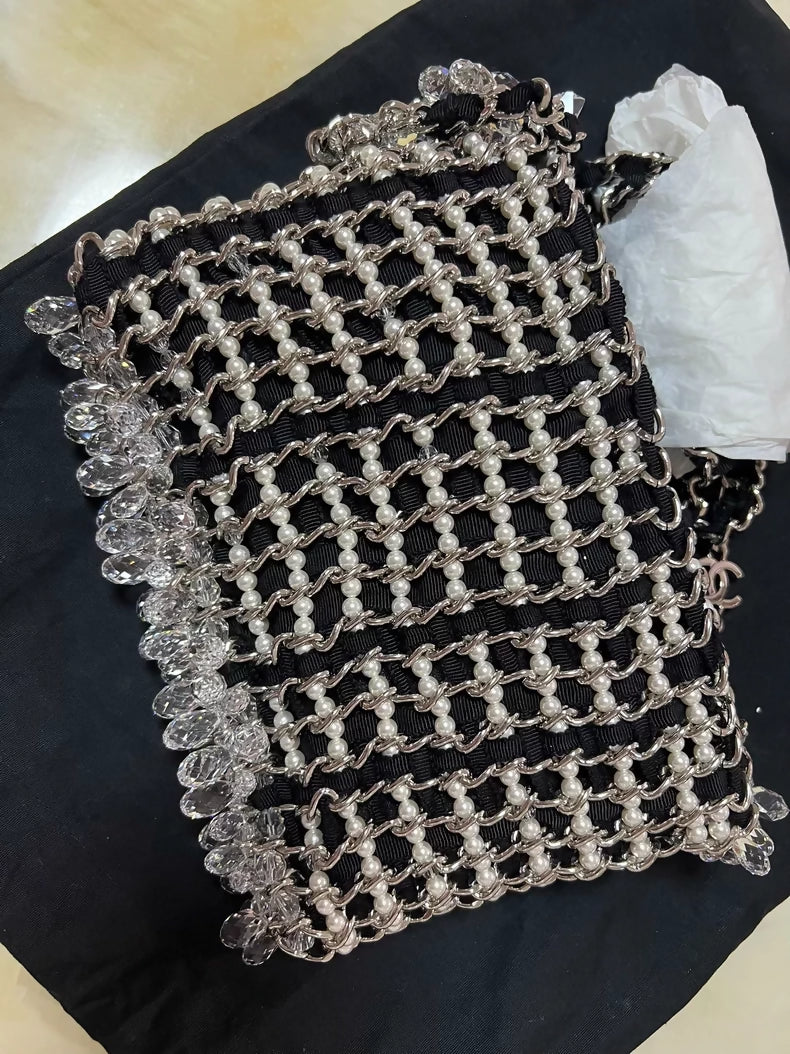 Chanel 19K Black and white tweed chain clutch bag