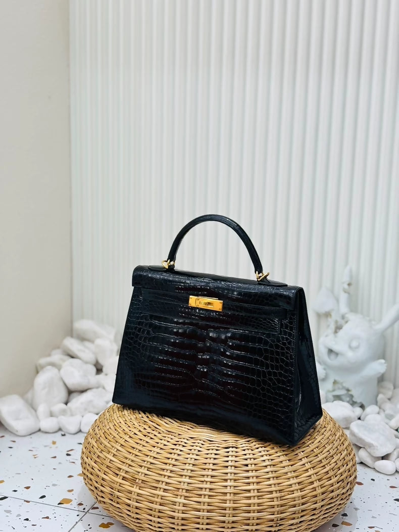 Hermes Kelly 32 shiny black crocodile leather gold hardware